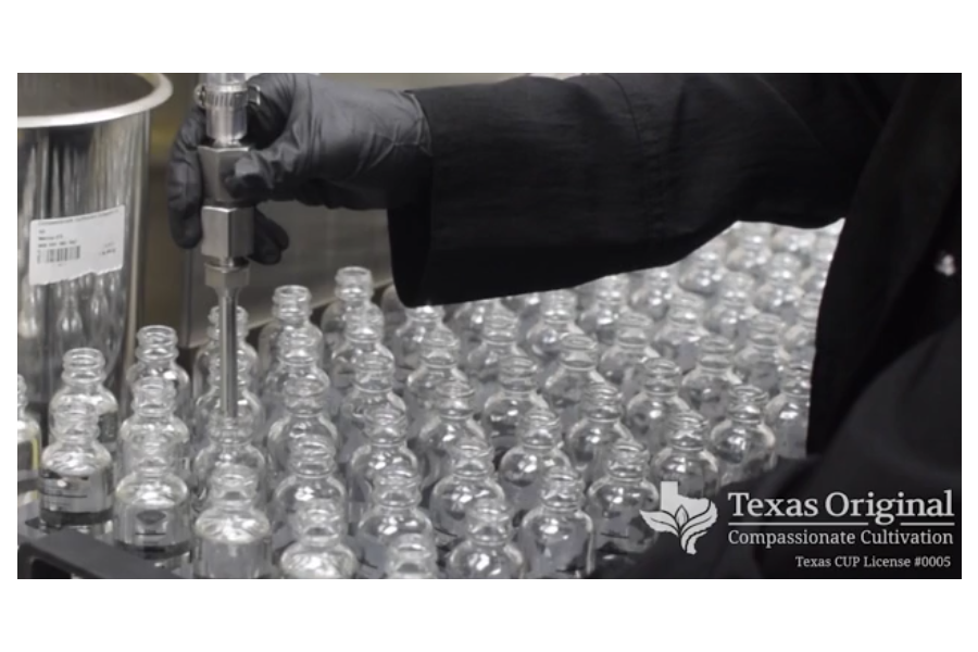 Medical marijuana tincture is bottled at Texas Original Compassionate Cultivation